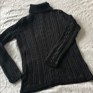 Eight eight eight. Turtle neck sweater.